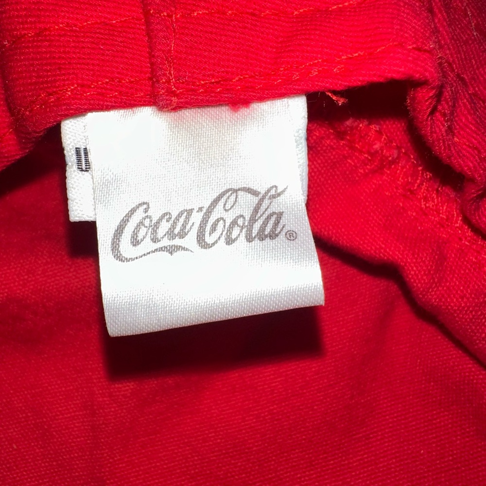 Coca-Cola bucket hat with a bottle opener attachment and an adjustable string - Picture 8 of 9